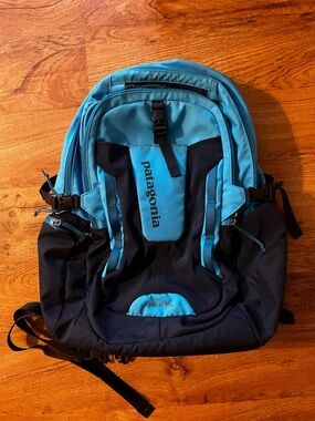 Patagonia Paxat 32L daypack travel backpack light blue and navy